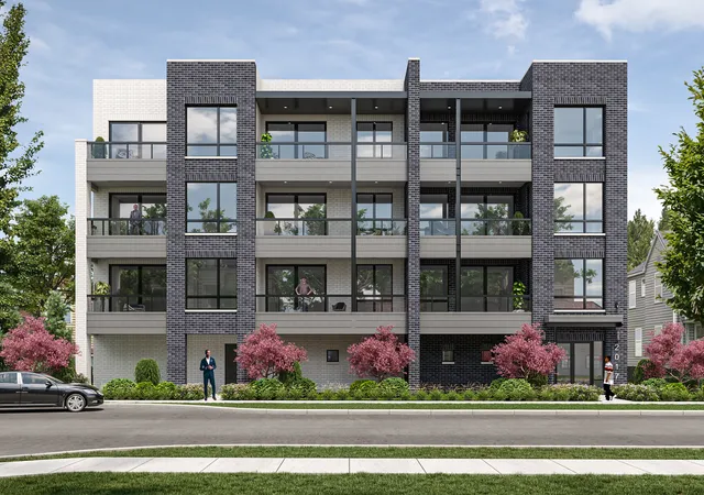 a front view of building with yard