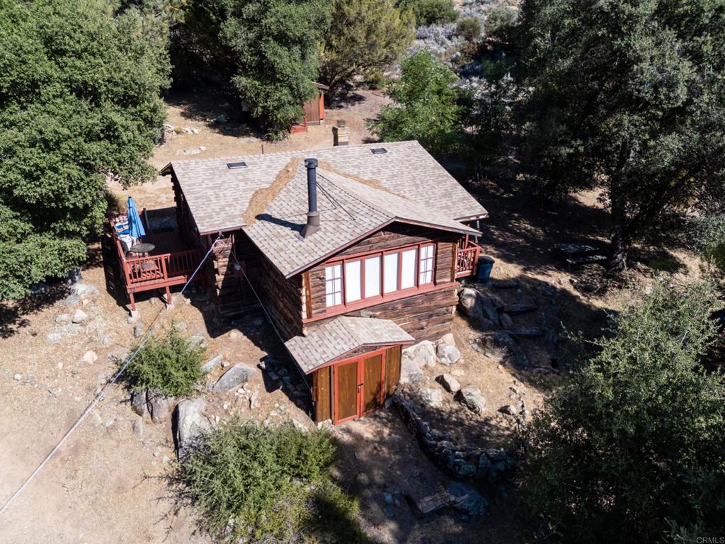 9150- Pine Creek Road Pine Valley, CA 91962 - Photo 1 of 44 an aerial view of a house with balcony and garden