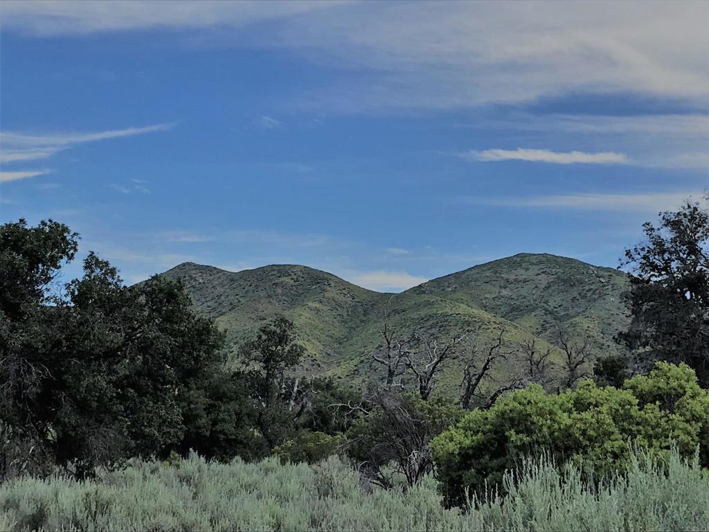 9150- Pine Creek Road Pine Valley, CA 91962 - Photo 41 of 44 a view of a mountain range in a cloudy sky