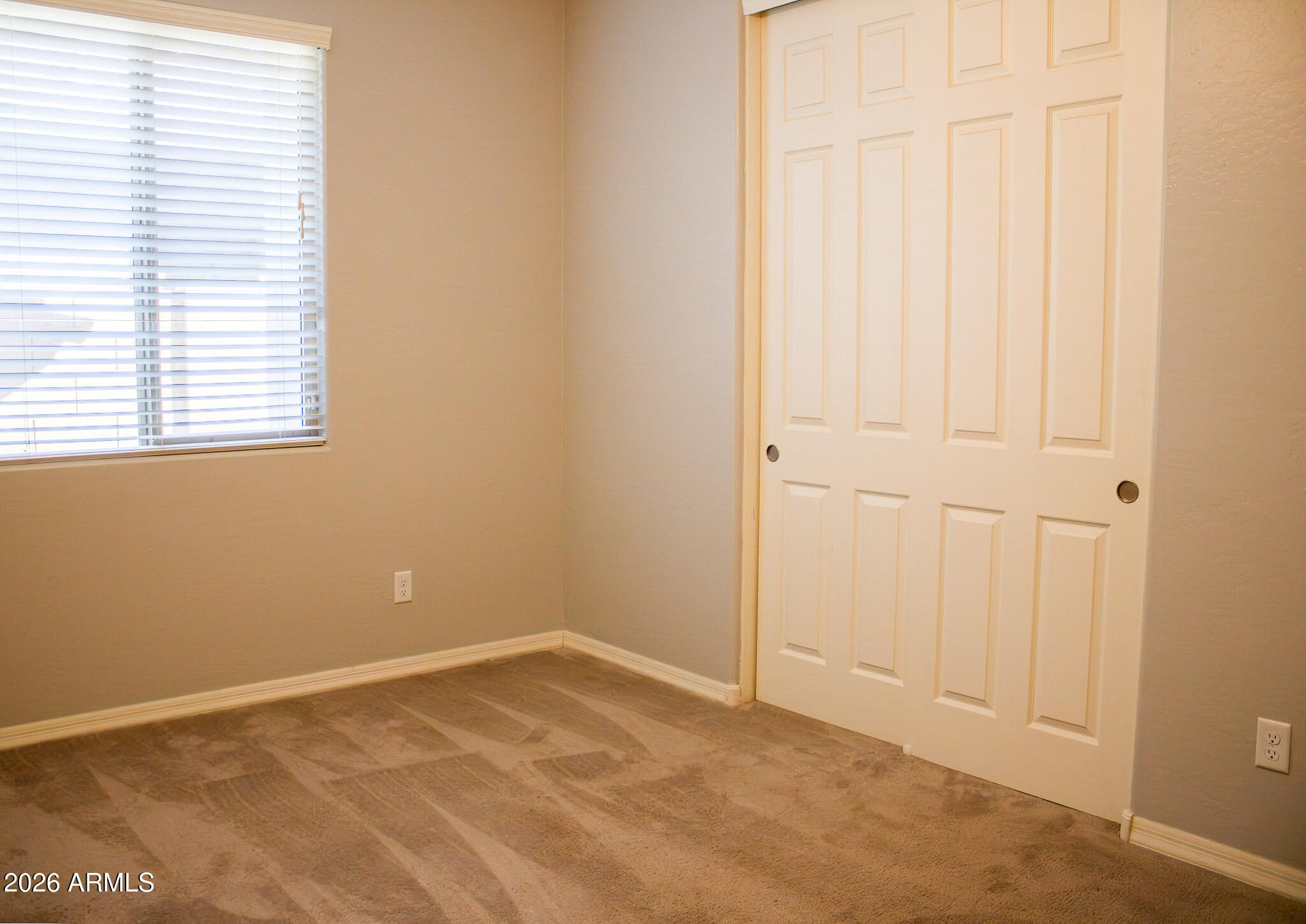 20378 West Maiden Lane Buckeye, AZ 85396 - Photo 14 of 41 an empty room with a window