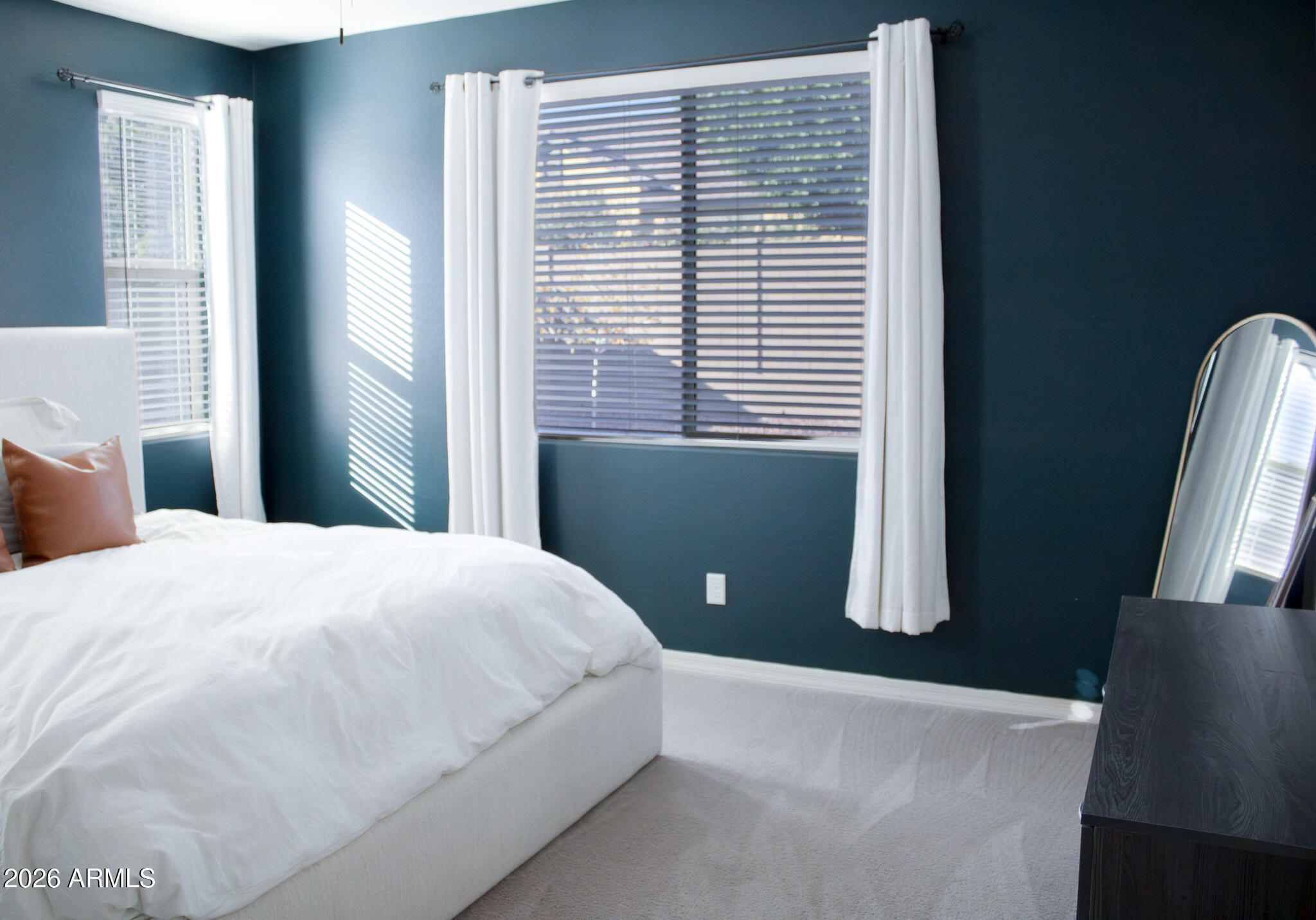 20378 West Maiden Lane Buckeye, AZ 85396 - Photo 25 of 41 a bedroom with a bed and a large window