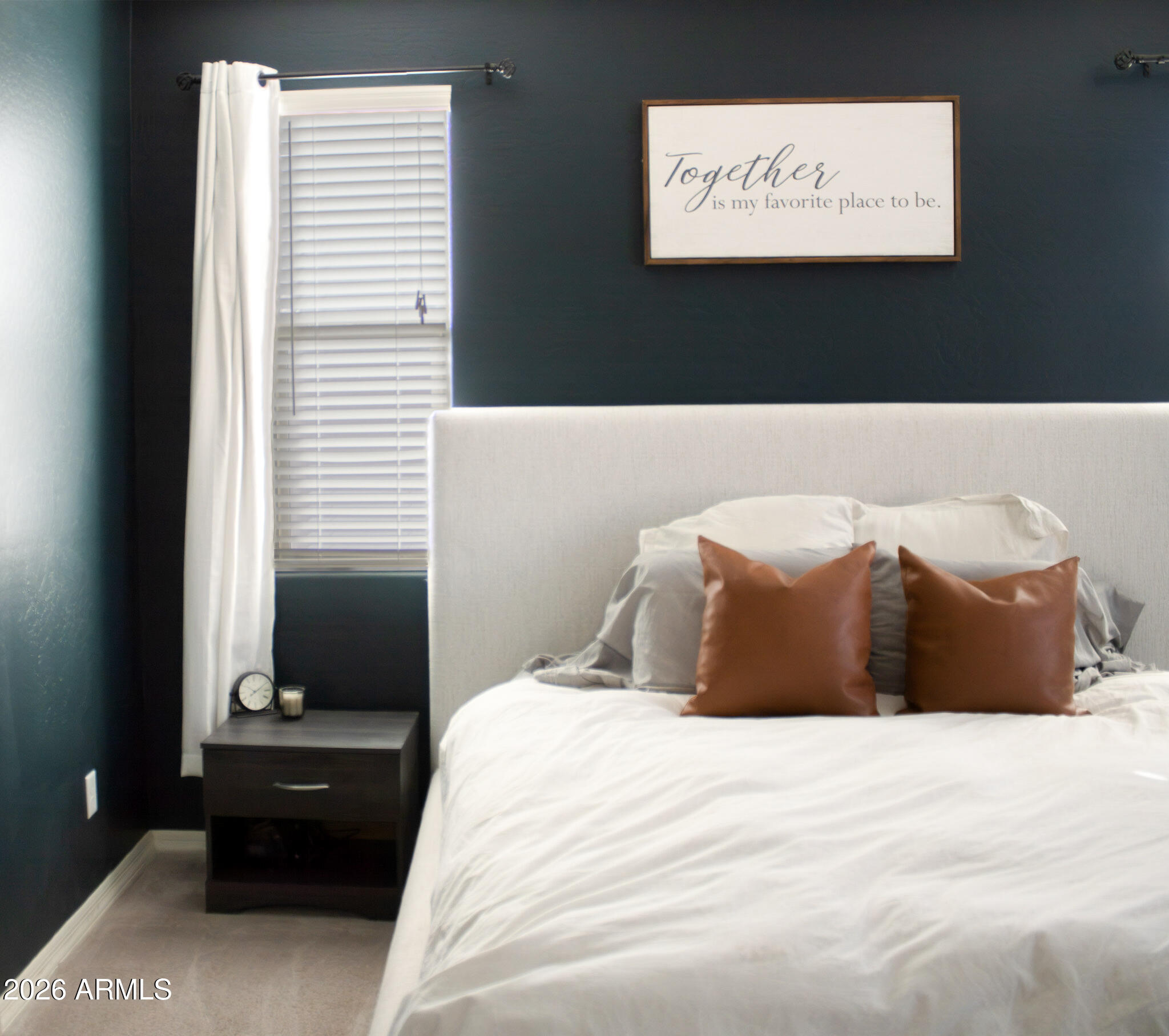 20378 West Maiden Lane Buckeye, AZ 85396 - Photo 26 of 41 a bedroom with a bed and a window