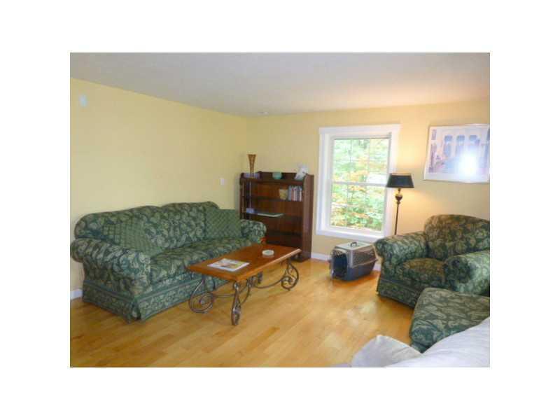 7 Quail Run Kennebunk, ME 04043 - Photo 8 of 17 Living Room. FOUR WINDOWS IN LIVING...