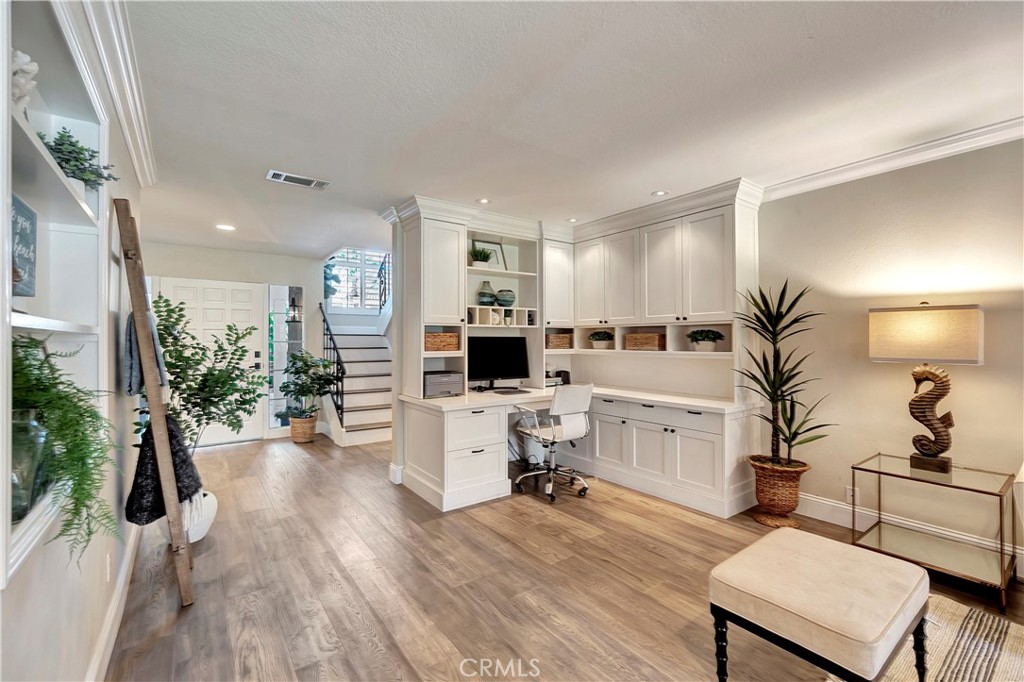 507 Cancha Newport Beach, CA 92660 - Photo 13 of 39 a living room with furniture and a wooden floor