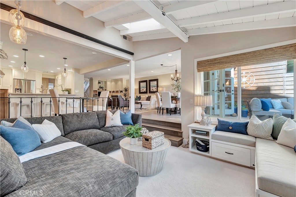 507 Cancha Newport Beach, CA 92660 - Photo 20 of 39 a living room with furniture and a large window