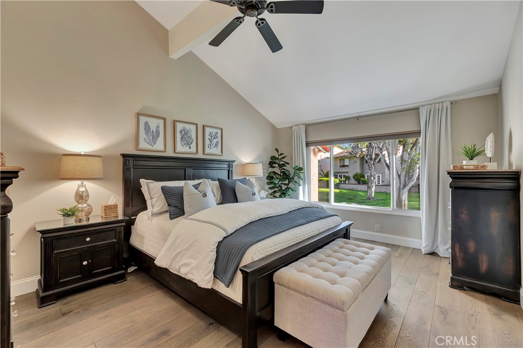 507 Cancha Newport Beach, CA 92660 - Photo 29 of 39 a bedroom with a bed and a tv