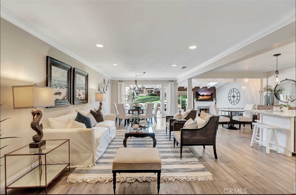 507 Cancha Newport Beach, CA 92660 - Photo 6 of 39 a living room with furniture and a large window