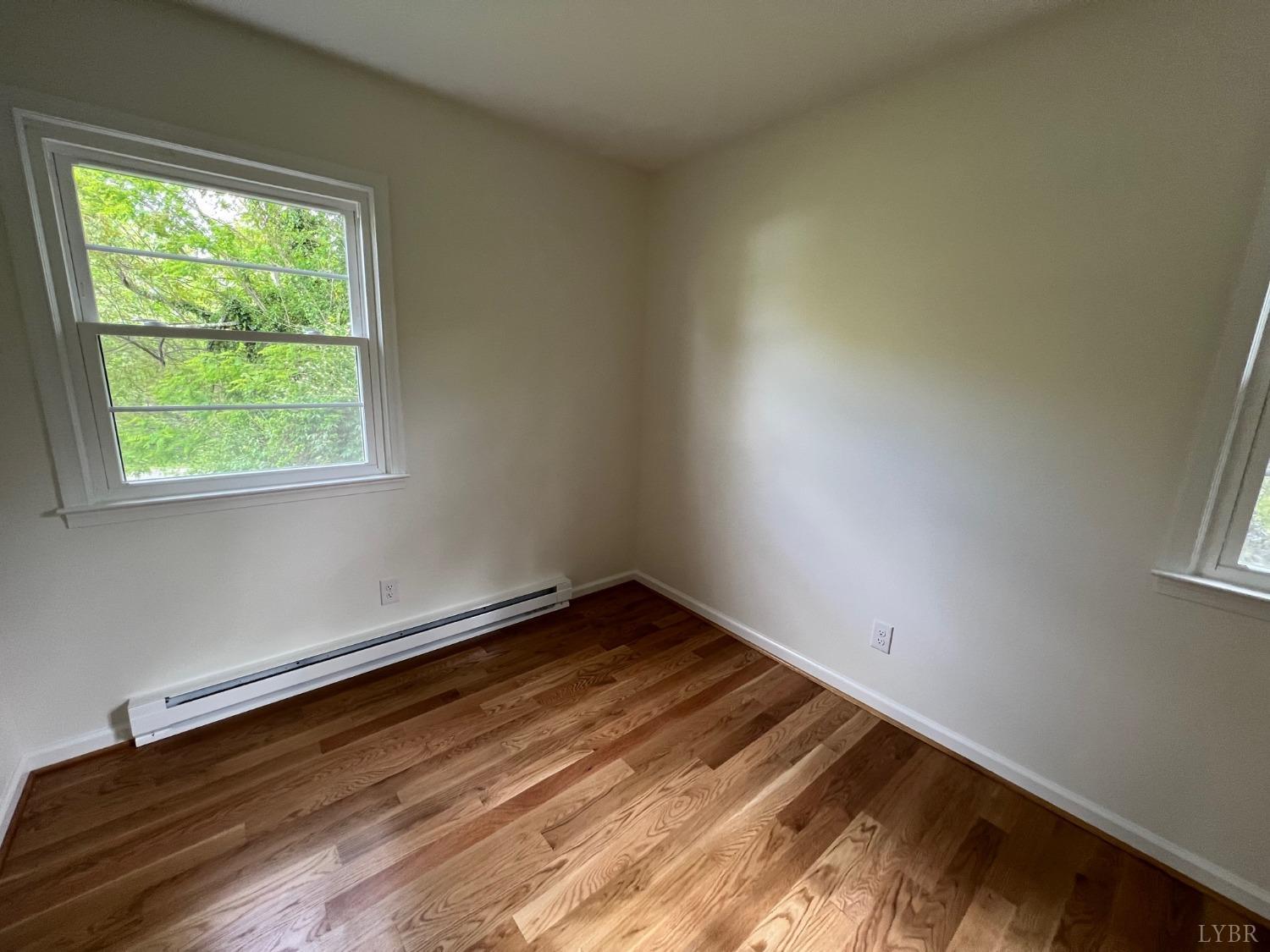 145 Church Street Amherst, VA 24521 - Photo 14 of 23 an empty room with a window