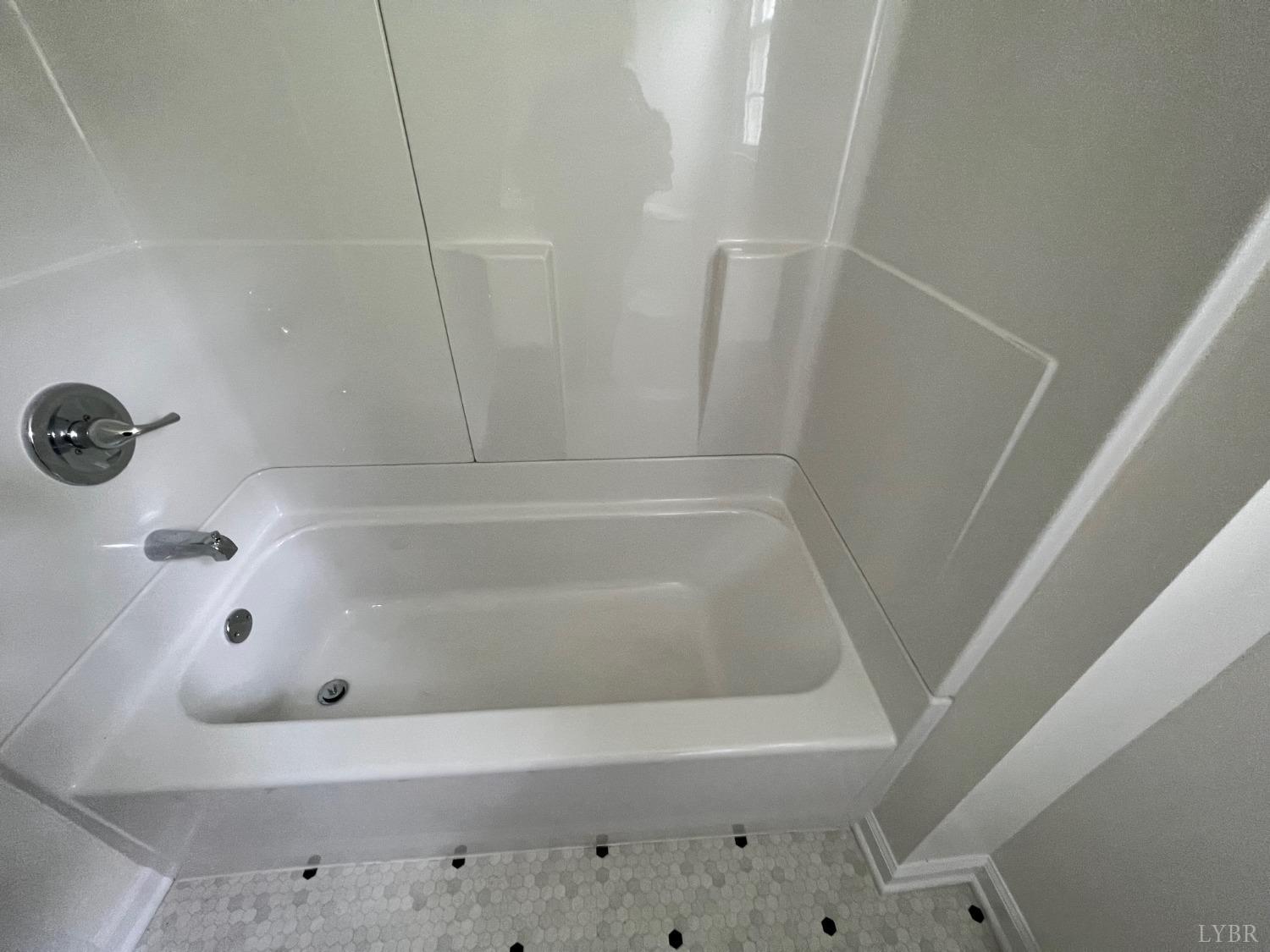 145 Church Street Amherst, VA 24521 - Photo 17 of 23 a bathroom with a tub