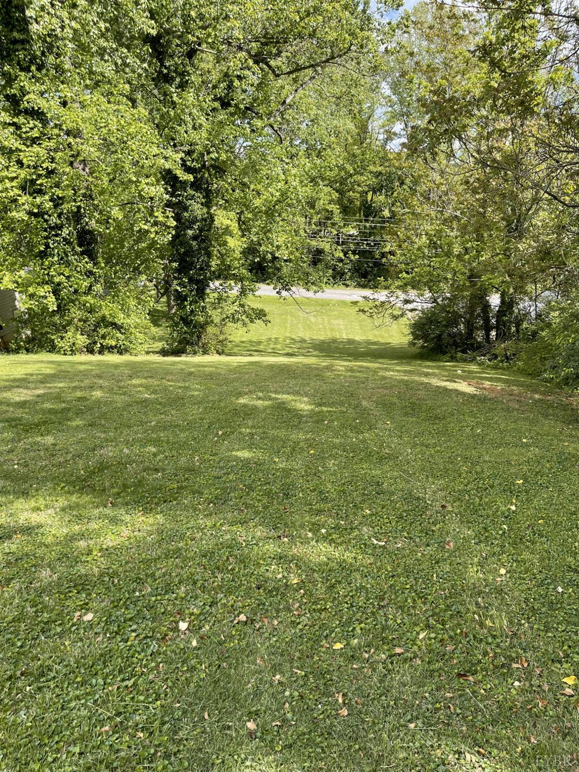 145 Church Street Amherst, VA 24521 - Photo 5 of 23 a view of a green field