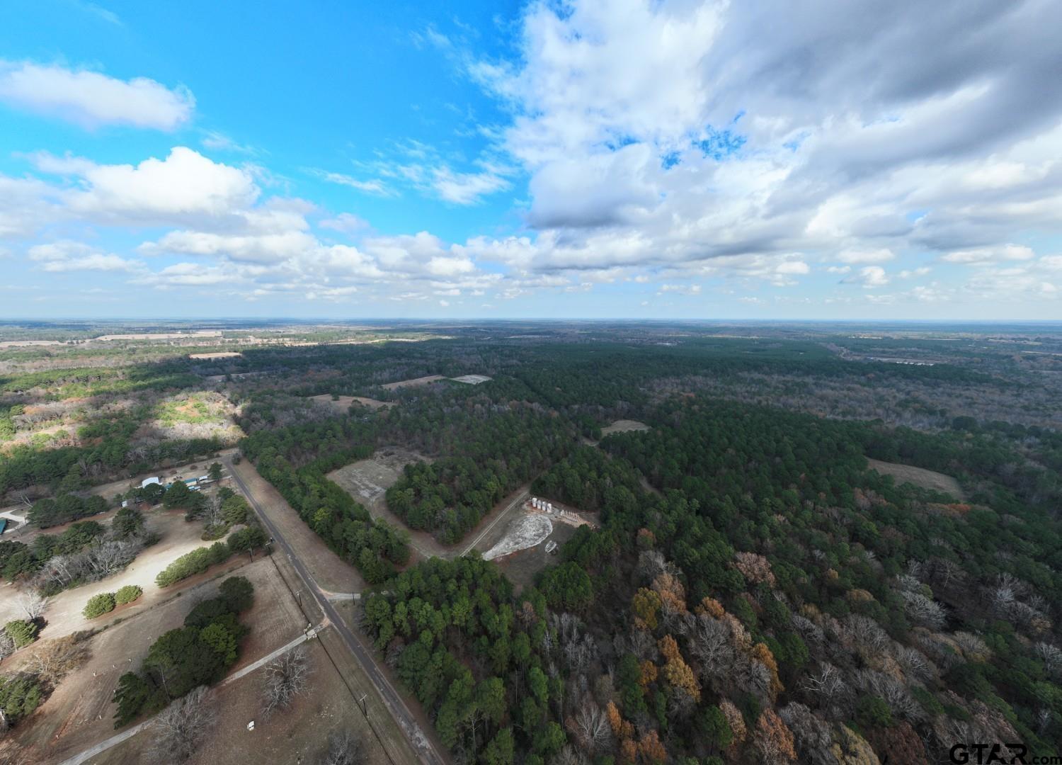 Tbd Leisure Lane Waskom, TX 75692 - Photo 2 of 20 a view of a lake from a yard