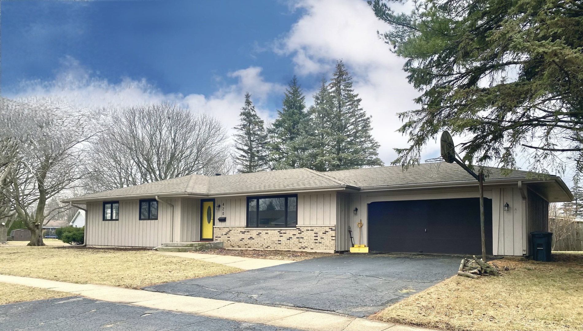 420 Ridge Drive DeKalb, IL 60115 - Photo 1 of 1 a front view of a house with a yard
