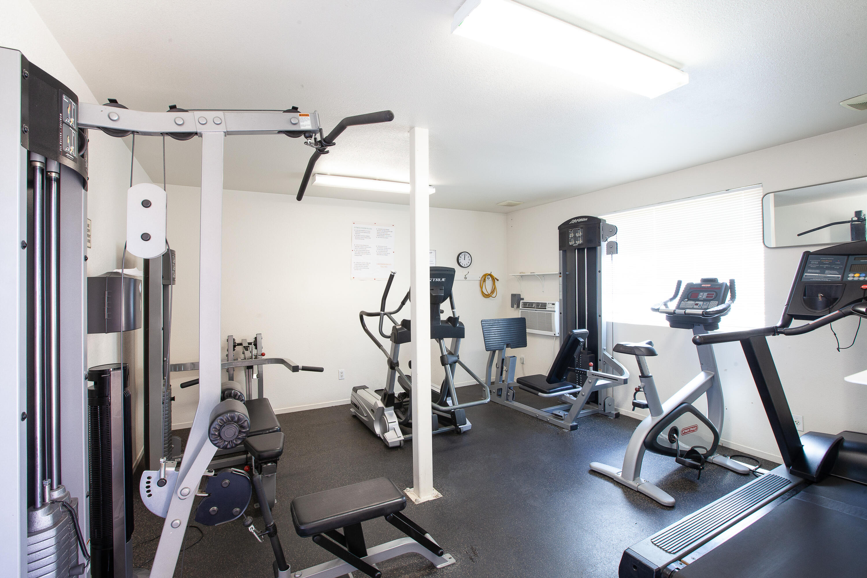 2348 Los Coyotes Drive Palm Springs, CA 92264 - Photo 12 of 15 a view of a room with gym equipment