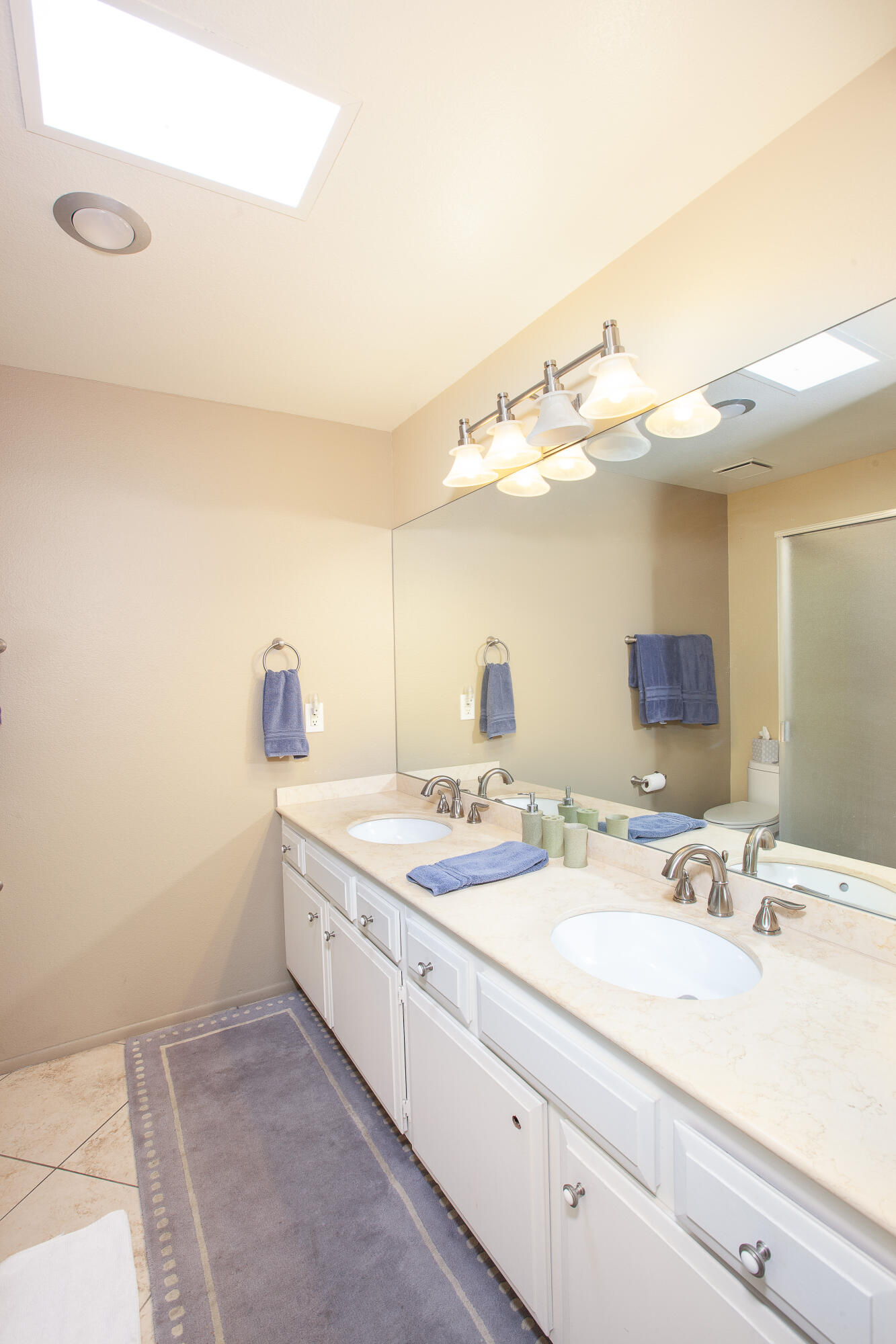2348 Los Coyotes Drive Palm Springs, CA 92264 - Photo 7 of 15 a bathroom with a sink and a mirror