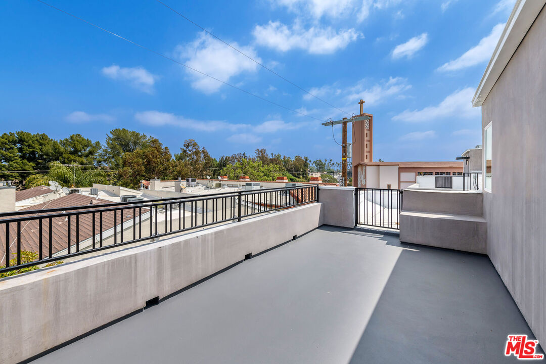 4337 Dixie Canyon Avenue Sherman Oaks, CA 91423 - Photo 19 of 22 a view of a balcony with city view