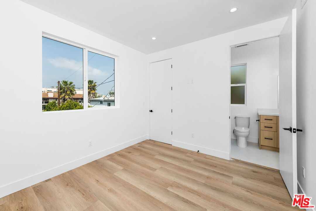4337 Dixie Canyon Avenue Sherman Oaks, CA 91423 - Photo 9 of 22 a view of empty room with wooden floor