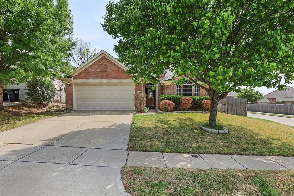 3920 Drexmore Road Fort Worth, TX 76244 - Photo 1 of 1 a front view of a house with garden