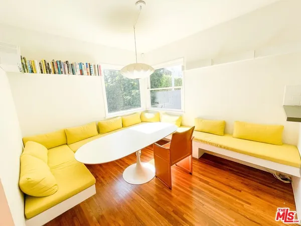 a living room with a table and a couch