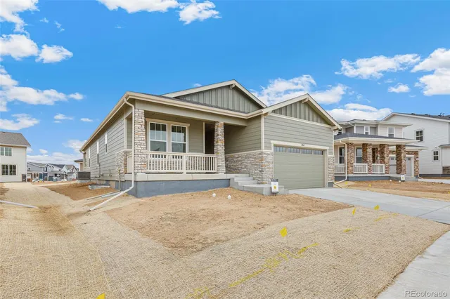a front view of a house with a patio