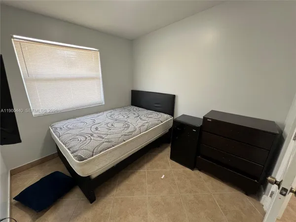a room with a bed and a table