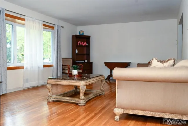 a living room with a couch and a table