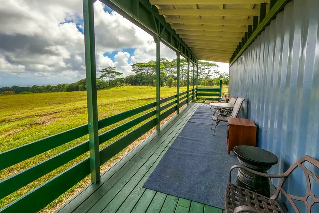 a view of swimming pool with seating space
