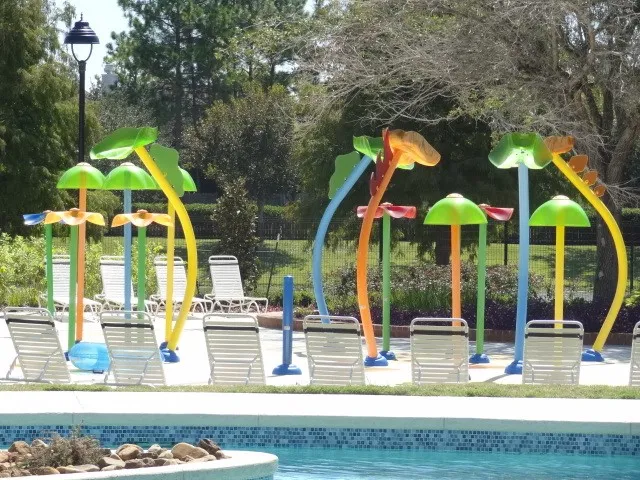 a view of swimming pool with outdoor seating