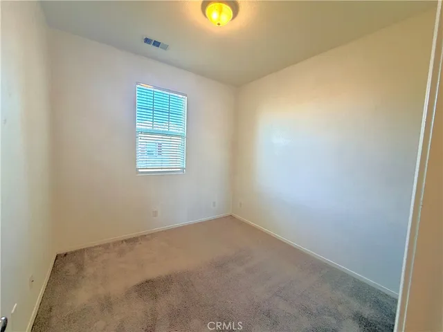 an empty room with closet