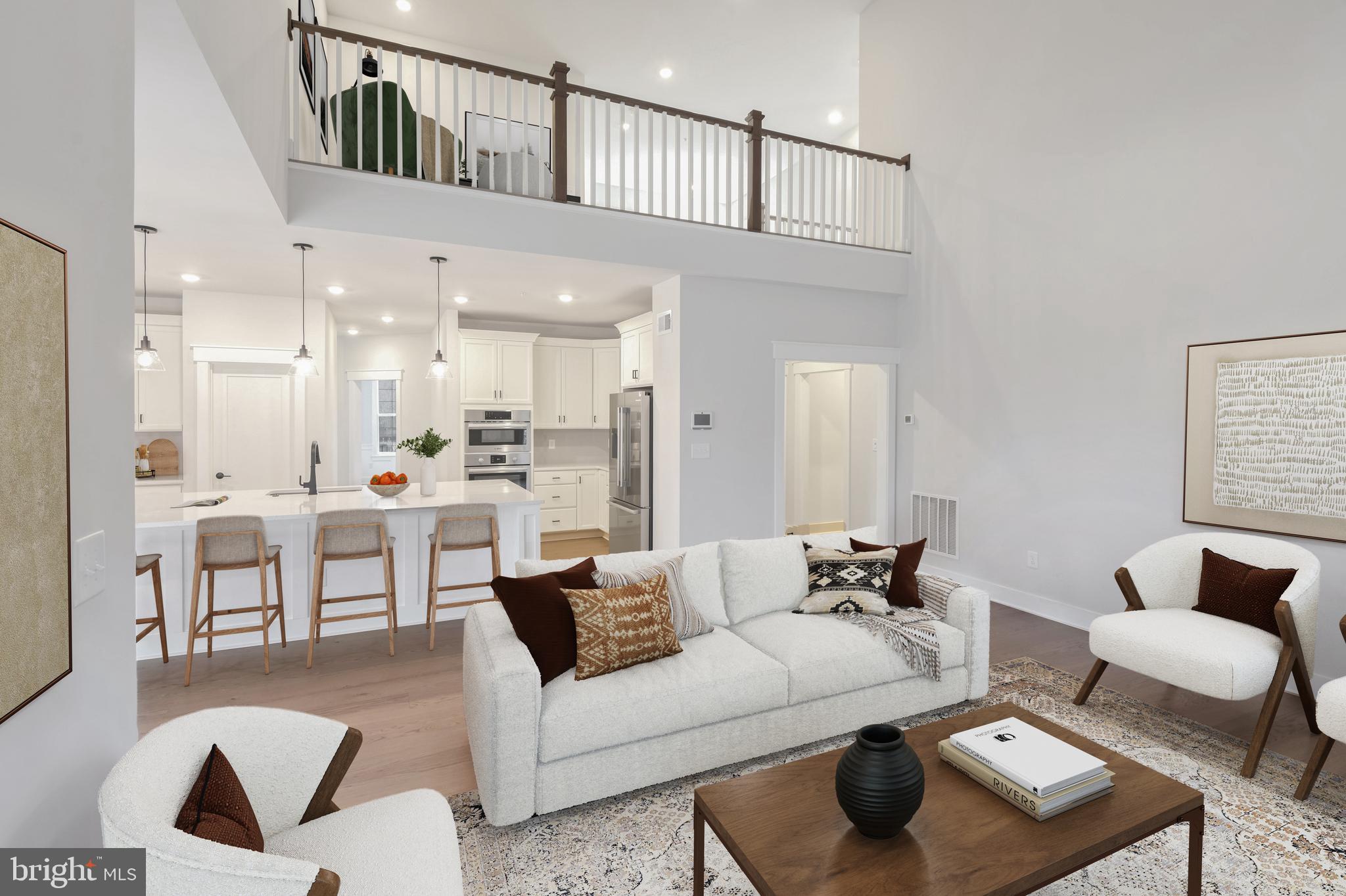 11309 Eliana Court Laurel, MD 20708 - Photo 12 of 48 a living room with furniture and a view of kitchen
