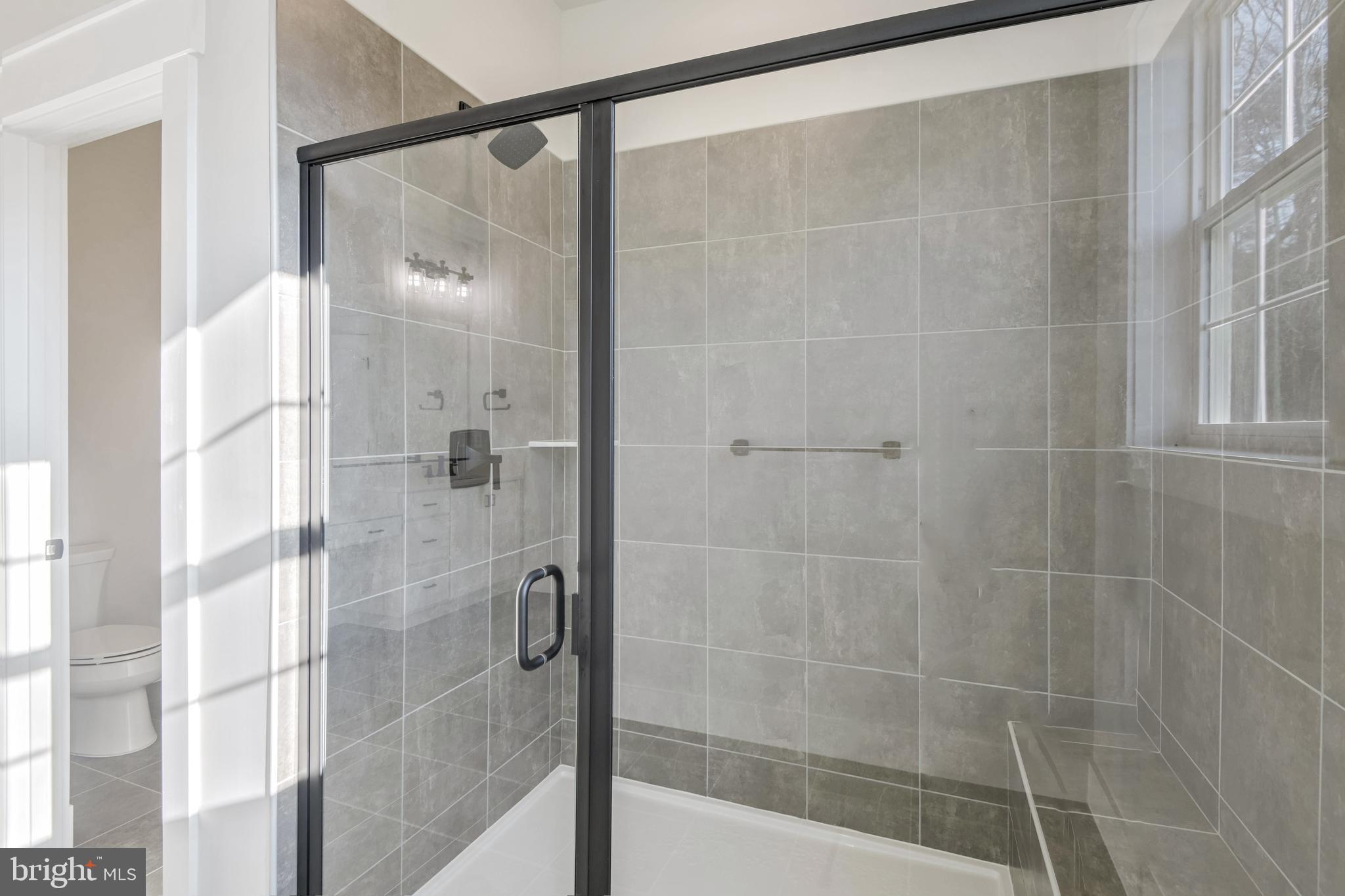 11309 Eliana Court Laurel, MD 20708 - Photo 23 of 48 a bathroom with a shower