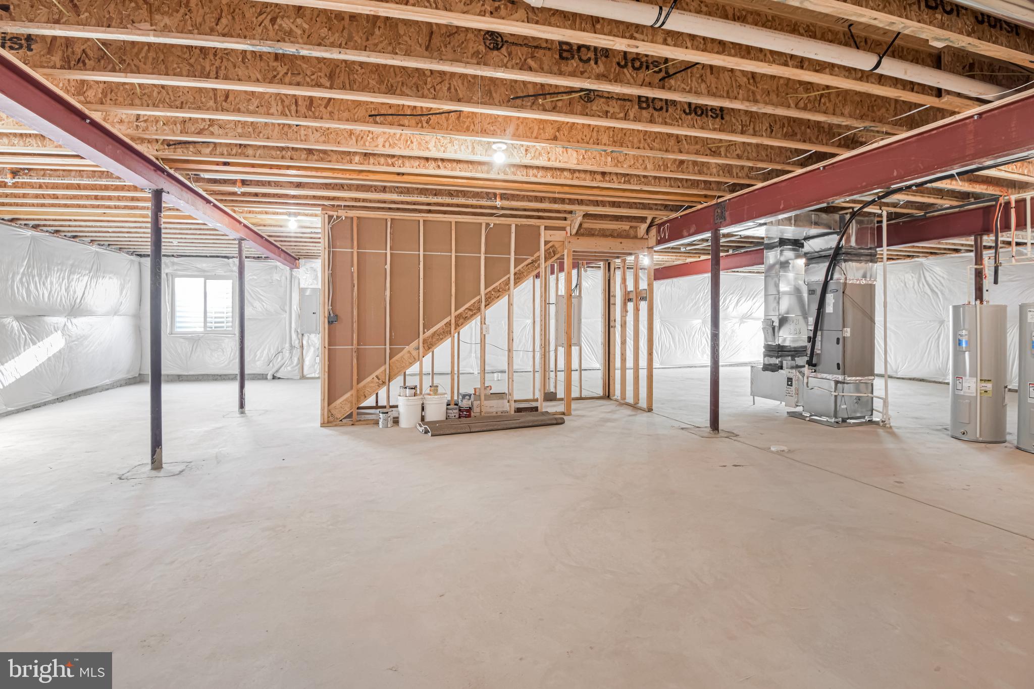 11309 Eliana Court Laurel, MD 20708 - Photo 38 of 48 a view of an empty room with wooden floor