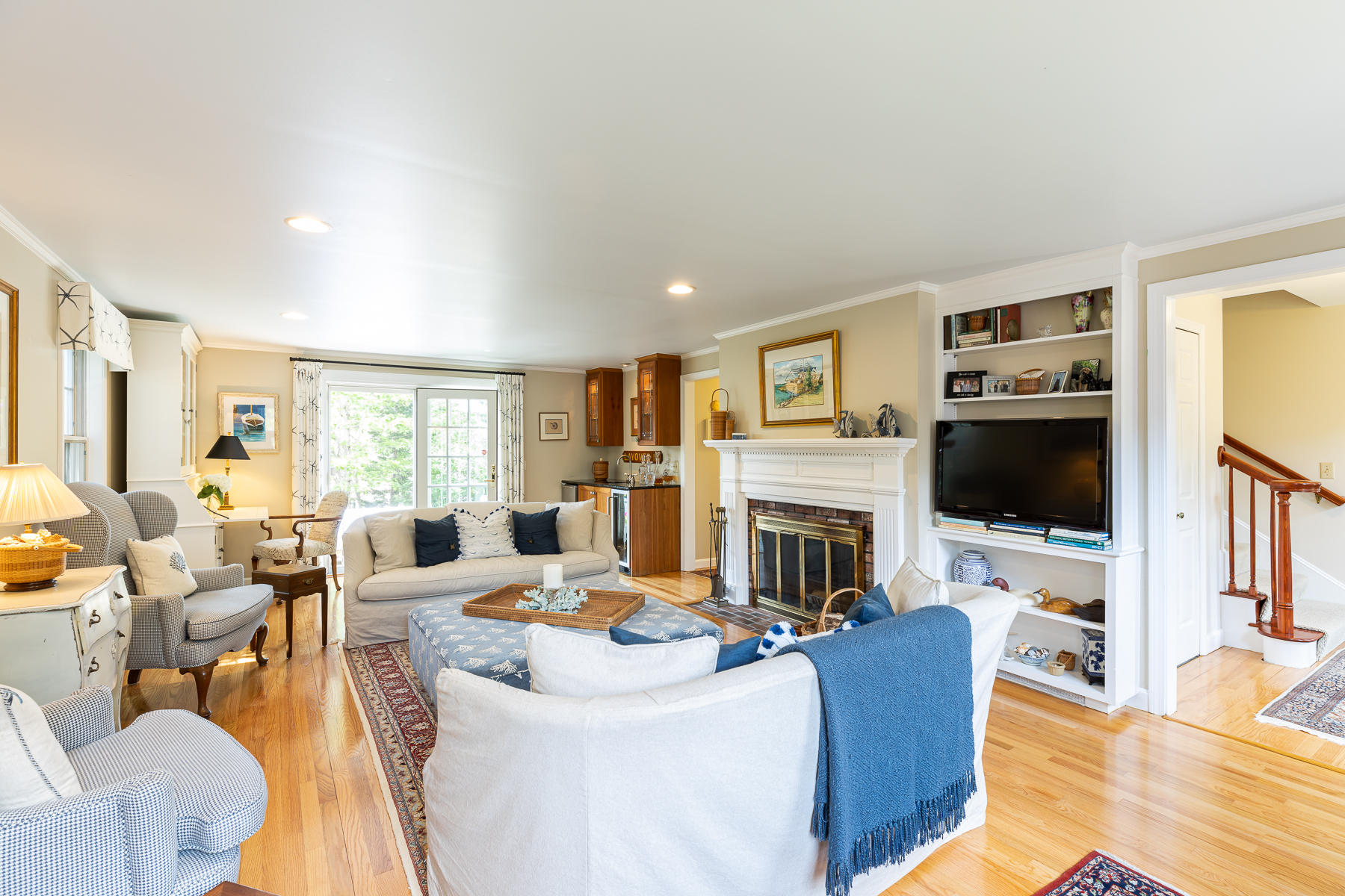 1122 Old Post Road Cotuit, MA 02635 - Photo 15 of 32 a living room with fireplace furniture and a flat screen tv