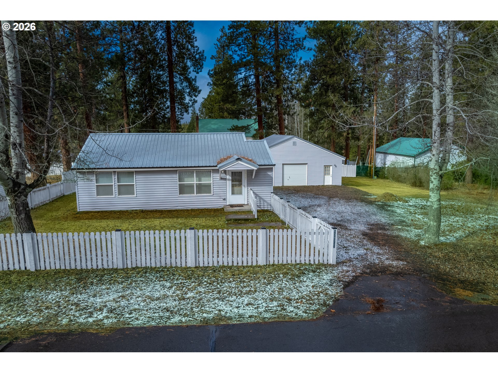 138722 Rhododendron Street Gilchrist, OR 97737 - Photo 1 of 27 a aerial view of a house with a yard