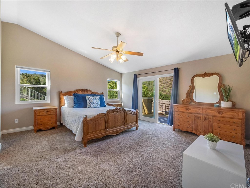 2 Whippoorwill Road Trabuco Canyon, CA 92679 - Photo 25 of 57 a bedroom with a bed and a window