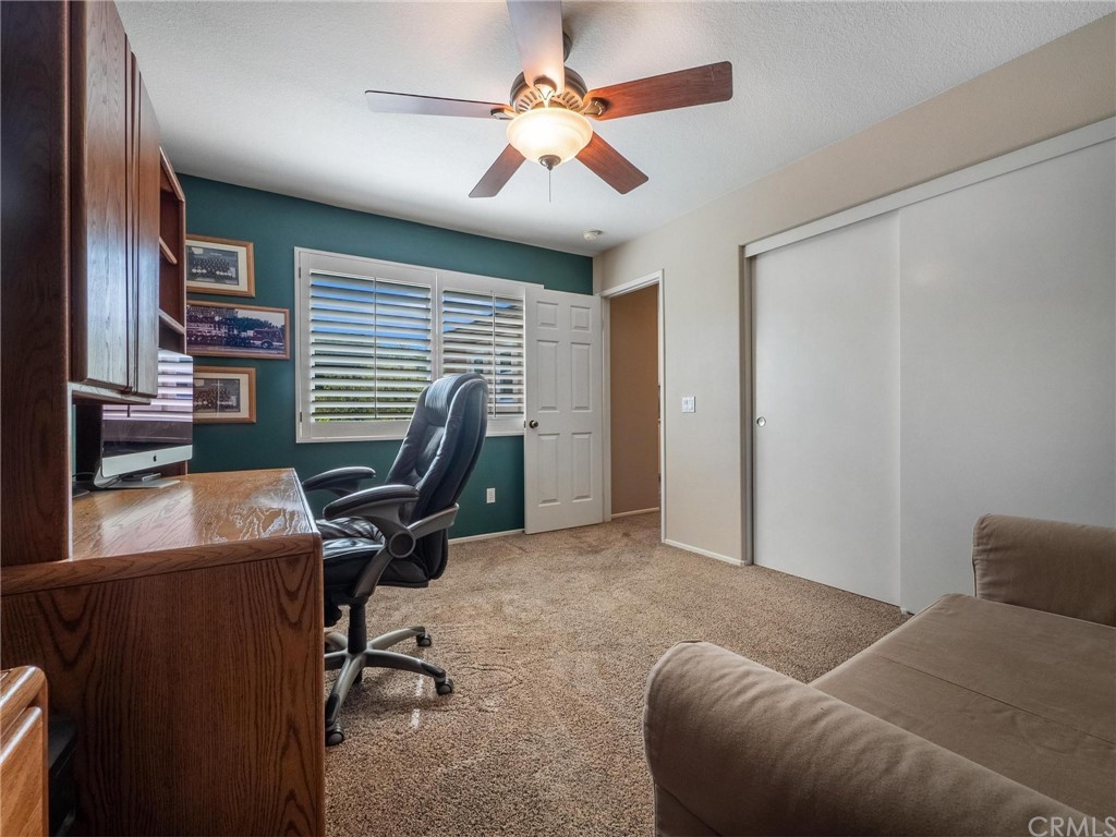 2 Whippoorwill Road Trabuco Canyon, CA 92679 - Photo 35 of 57 a view of a livingroom with workspace and a window