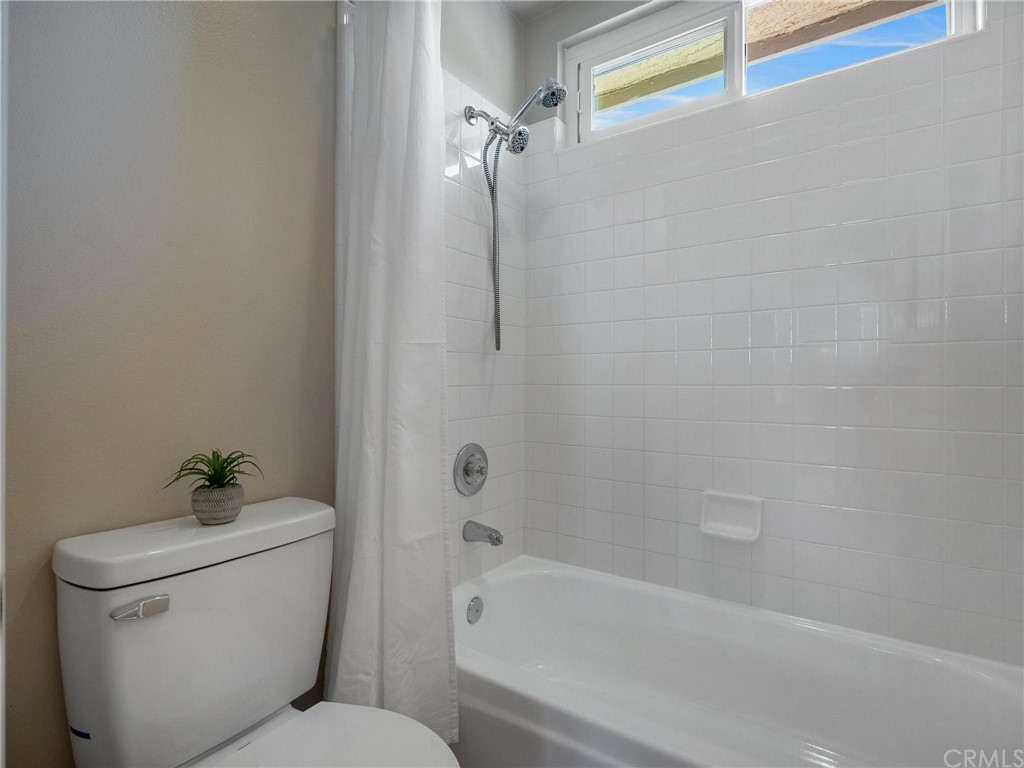 2 Whippoorwill Road Trabuco Canyon, CA 92679 - Photo 37 of 57 a bathroom with a toilet and a tub