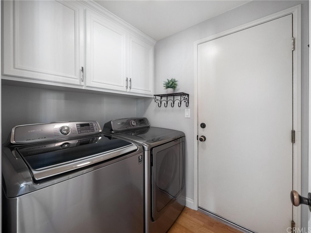 2 Whippoorwill Road Trabuco Canyon, CA 92679 - Photo 43 of 57 a utility room with dryer and washer