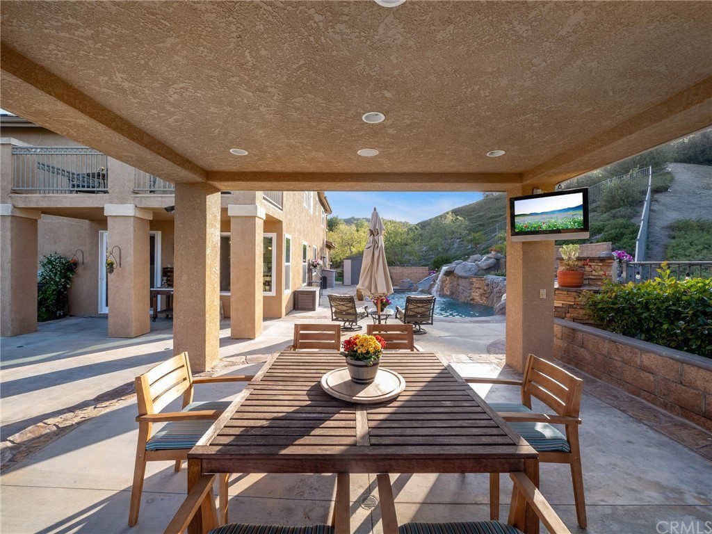 2 Whippoorwill Road Trabuco Canyon, CA 92679 - Photo 45 of 57 a view of a dining room with furniture window and wooden floor