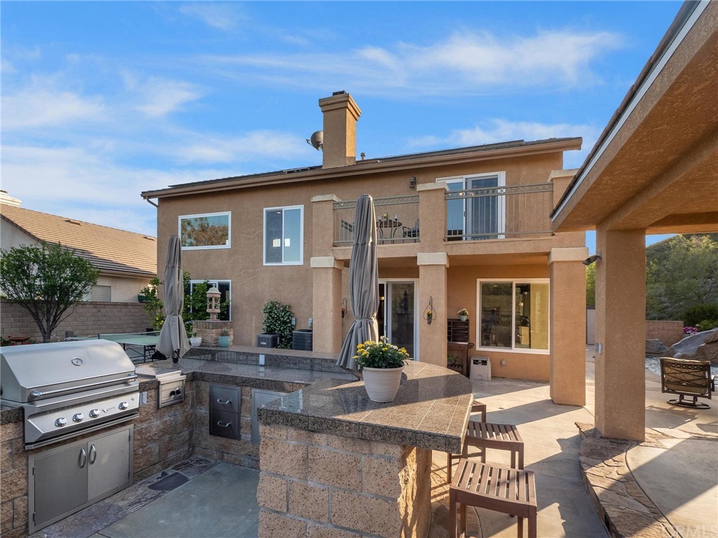 2 Whippoorwill Road Trabuco Canyon, CA 92679 - Photo 46 of 57 a view of a house with backyard and sitting area