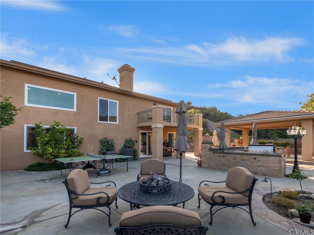 2 Whippoorwill Road Trabuco Canyon, CA 92679 - Photo 47 of 57 a building outdoor space with patio furniture
