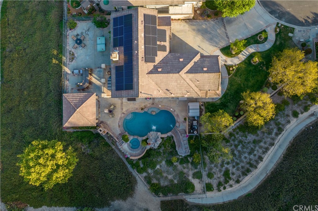 2 Whippoorwill Road Trabuco Canyon, CA 92679 - Photo 54 of 57 an aerial view of a house with a yard and garden