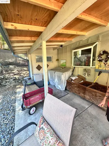 a view of a chairs in front of retail shop
