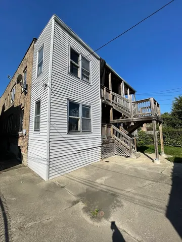 a view of a house with a patio