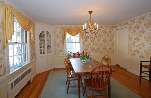 57 Emerson Road Wellesley, MA 02481 - Photo 3 of 9 a view of a dining room with furniture window and outside view