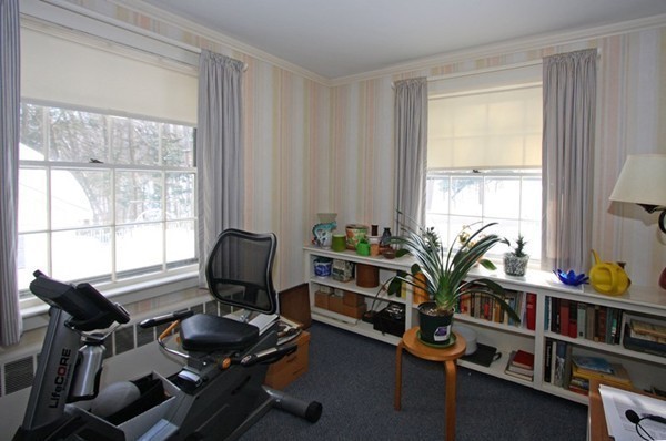 57 Emerson Road Wellesley, MA 02481 - Photo 7 of 9 a view of a workspace with furniture and a window