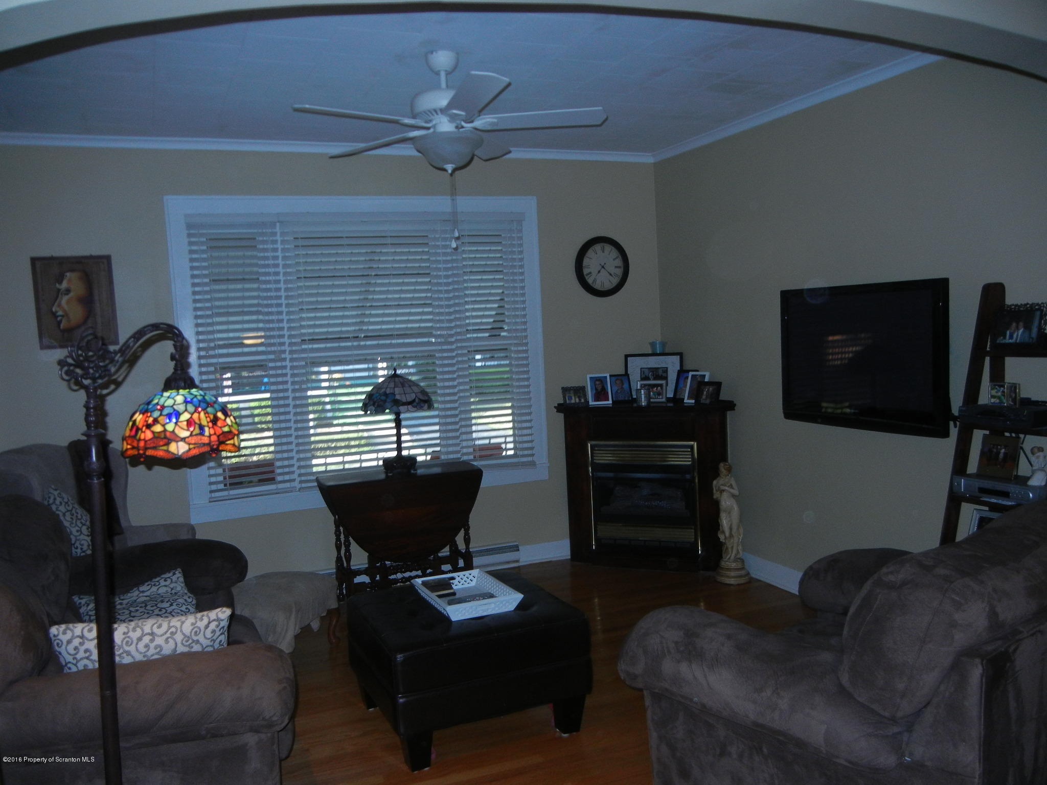 2024 Rigg Street Dunmore, PA 18512 - Photo 3 of 28 a living room with furniture and a fireplace