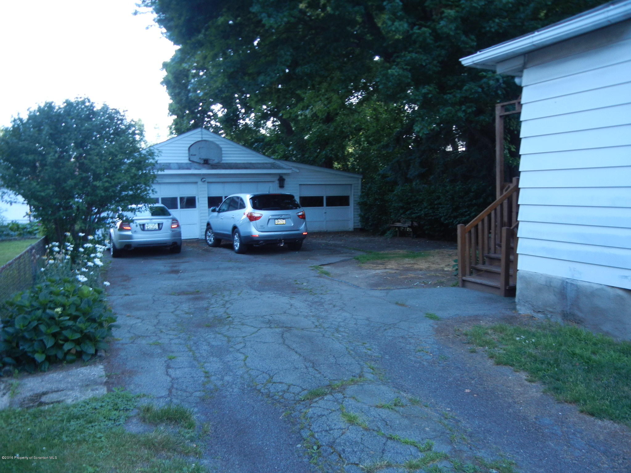 2024 Rigg Street Dunmore, PA 18512 - Photo 5 of 28 a view of a house with a yard