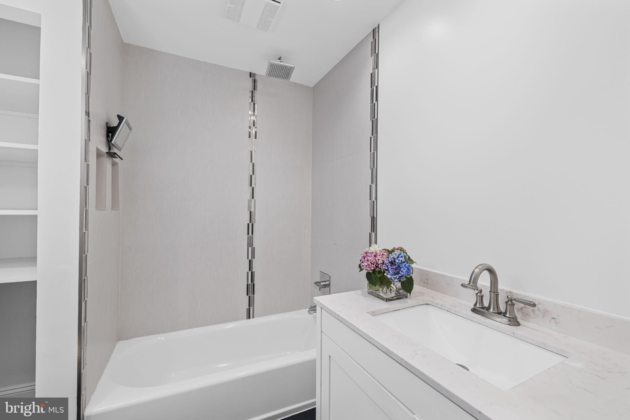 1855 Calvert Street Northwest, Unit 102 Washington, DC 20009 - Photo 15 of 16 Ensuite Full Bath