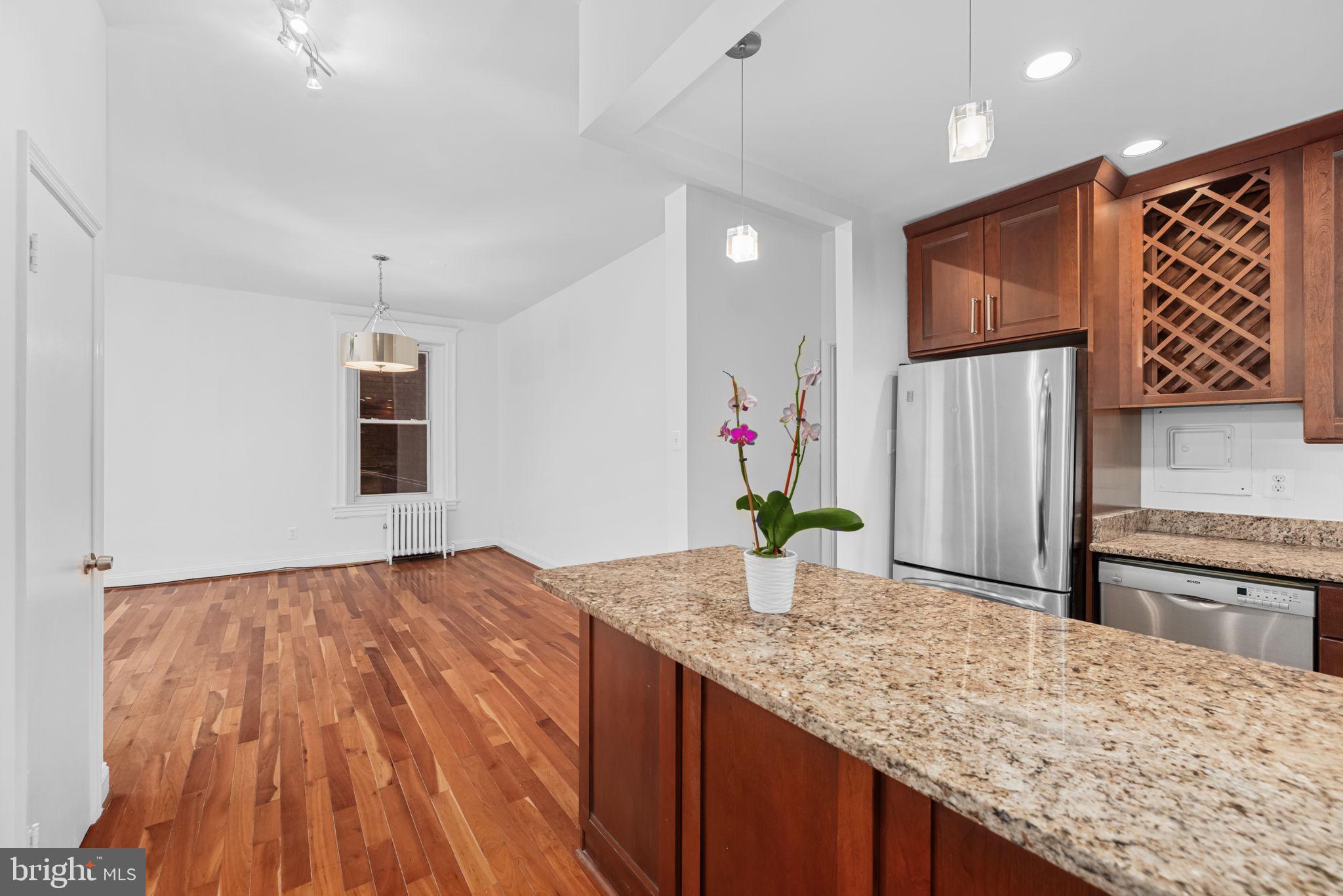 1855 Calvert Street Northwest, Unit 102 Washington, DC 20009 - Photo 16 of 16 Kitchen and Dining Area