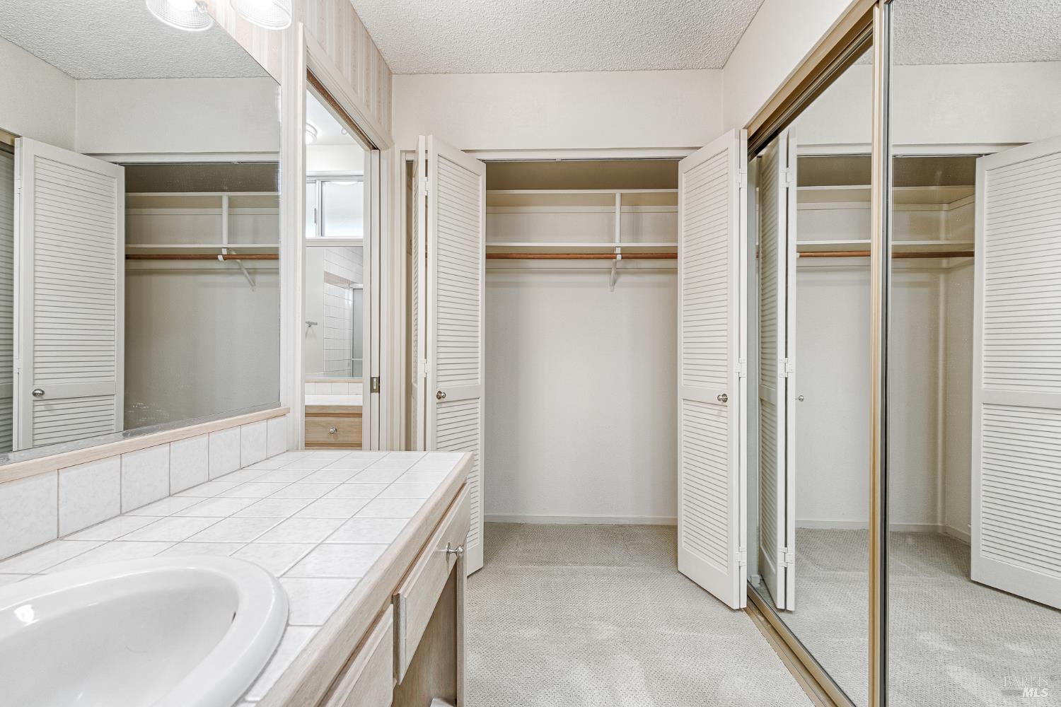 138 Oak Shadow Drive Santa Rosa, CA 95409 - Photo 33 of 50 a bathroom with a bathtub and a sink